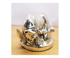 Csillagromboló bika. Marcello Giorgio laminált ezüst kisplasztikája.