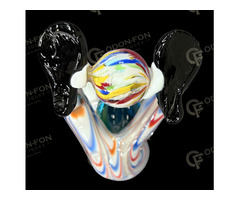 Kék sapkás, kézen álló bohóc figura – kisplasztika