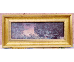 Hosszúkás falikép páros, a napnyugta fényeivel, masszív aranyozott fakeretben.