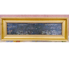 Hosszúkás falikép páros, a napnyugta fényeivel, masszív aranyozott fakeretben.