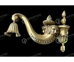 Ember fej díszítésű falikar