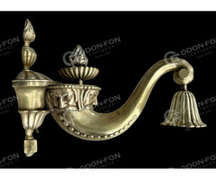 Ember fej díszítésű falikar