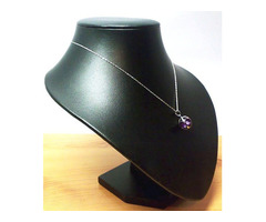 Gömbbe foglalt, csiszolt kristálymedál 22mm