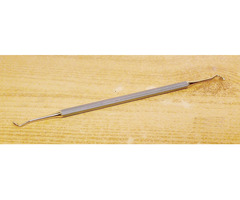 Modern aranyozott fogorvosi eszköz. Polírozó kompozit illesztéséhez.